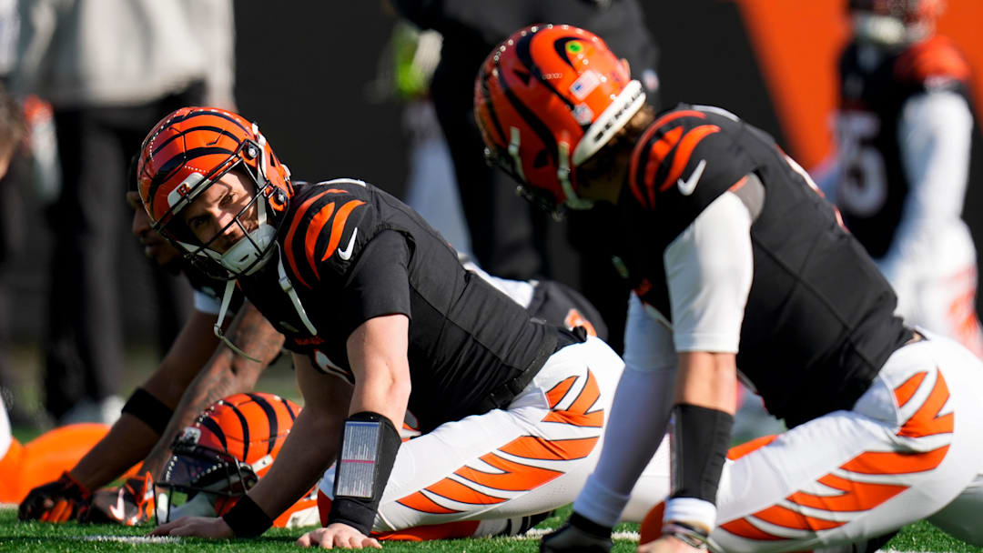 Cincinnati Bengals quarterback Jake Browning (6) stretches with Joe Burrow before the first quarter of the NFL Week 18 game between the Cincinnati Bengals and the Cleveland Browns at Paycor Stadium in Downtown Cincinnati on Sunday, Jan. 4, 2026.