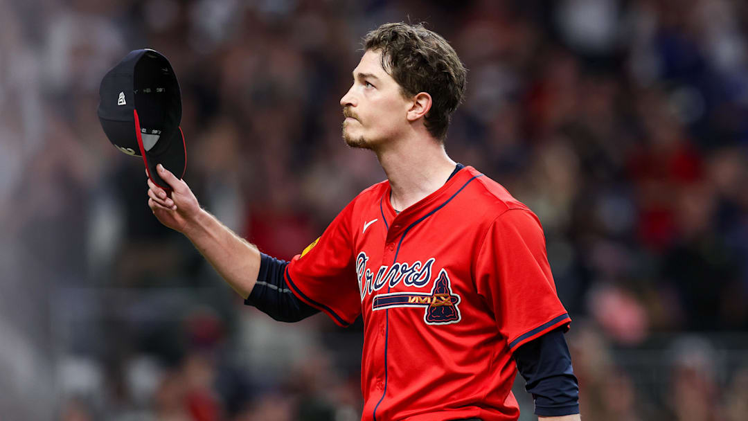 Sep 27, 2024; Atlanta, Georgia, USA; Atlanta Braves starting pitcher Max Fried (54) tips his hat to the crowd after being removed from a game against the Kansas City Royals in the ninth inning at Truist Park.