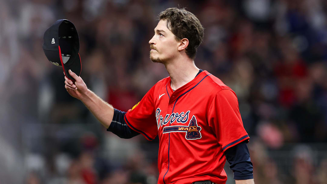 Sep 27, 2024; Atlanta, Georgia, USA; Atlanta Braves starting pitcher Max Fried (54) tips his hat to the crowd after being removed from a game against the Kansas City Royals in the ninth inning at Truist Park. Mandatory Credit: Brett Davis-Imagn Images