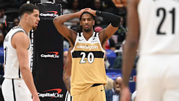 Nov 16, 2025; Washington, District of Columbia, USA;  Washington Wizards center Alex Sarr (20) reacts after a foul call against the Brooklyn Nets during the third quarter at Capital One Arena. Mandatory Credit: Rafael Suanes-Imagn Images