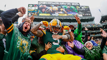 Green Bay Packers wide receiver Christian Watson (9) flexes as he does a “Lambeau Leap” with Packers fans after scoring a touchdown against the Arizona Cardinals on Sunday, October 13, 2024, at Lambeau Field in Green Bay, Wis. The Packers won the game, 34-13
Tork Mason/USA TODAY NETWORK-Wisconsin