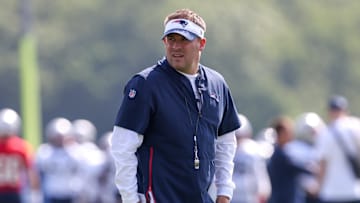 Jul 30, 2021; Foxborough, MA, United States;  New England Patriots offensive coordinator Josh McDaniels reacts during training camp at Gillette Stadium. Mandatory Credit: Paul Rutherford-Imagn Images