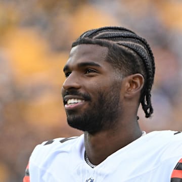 Oct 12, 2025; Pittsburgh, Pennsylvania, USA; Cleveland Browns quarterback Shedeur Sanders (12) watches the action against the Pittsburgh Steelers during the fourth quarter at Acrisure Stadium. Mandatory Credit: Barry Reeger-Imagn Images