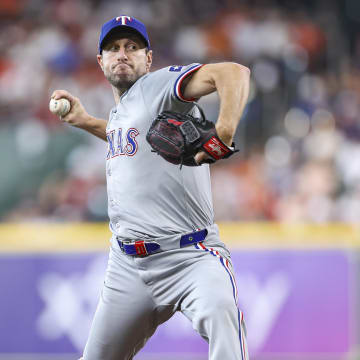 Jul 14, 2024; Houston, Texas, USA; Texas Rangers starting pitcher Max Scherzer (31) delivers a pitch during the second inning against the Houston Astros at Minute Maid Park. 