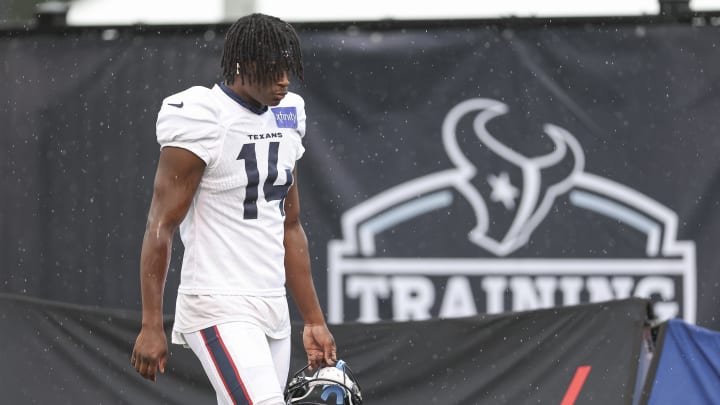 Jul 27, 2024; Houston, TX, USA; Houston Texans cornerback Kamari Lassiter (14) during training camp at Houston Methodist Training Center. Mandatory Credit: Troy Taormina-USA TODAY Sports