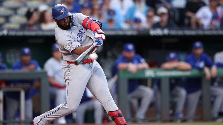 Sep 4, 2026; Kansas City, Missouri, USA;  Toronto Blue Jays first base Vladimir Guerrero Jr. (27) hits a single during the first inning against the Kansas City Royals at Kauffman Stadium.  Mandatory Credit: William Purnell-Imagn Images