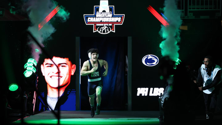 Penn State wrestler Beau Bartlett enters the arena for the 141-pound championship bout at the 2024 NCAA Wrestling Championships. 