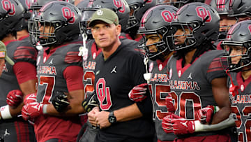 Oklahoma coach Brent Venables locks arms with players before a college football game between the University of Oklahoma Sooners (OU) and the Maine Black Bears at Gaylord Family - Oklahoma Memorial Stadium in Norman, Okla., Saturday, Nov. 2, 2024.