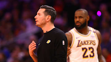 Nov 26, 2024; Phoenix, Arizona, USA; Los Angeles Lakers head coach JJ Redick and forward LeBron James (23) against the Phoenix Suns during an NBA Cup game at Footprint Center. Mandatory Credit: Mark J. Rebilas-Imagn Images