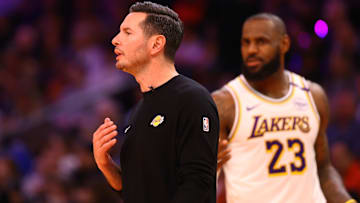 Los Angeles Lakers head coach JJ Redick and forward LeBron James (23) against the Phoenix Suns during an NBA Cup game at Footprint Center.