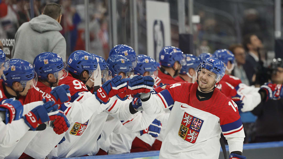 Feb 13, 2026; Milan, Italy;  Filip Chlapik of Czech Republic celebrates scoring their fifth goal with teammates against France in men's ice hockey group A play during the Milano Cortina 2026 Olympic Winter Games at Milano Santagiulia Ice Hockey Arena. Mandatory Credit: Geoff Burke-Imagn Images
