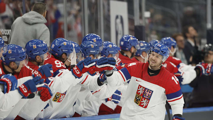 Feb 13, 2026; Milan, Italy;  Filip Chlapik of Czech Republic celebrates scoring their fifth goal with teammates against France in men's ice hockey group A play during the Milano Cortina 2026 Olympic Winter Games at Milano Santagiulia Ice Hockey Arena. Mandatory Credit: Geoff Burke-Imagn Images