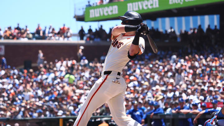 Jun 30, 2024; San Francisco, California, USA; San Francisco Giants second baseman Tyler Fitzgerald (49) hits a single against the Los Angeles Dodgers during the second inning at Oracle Park. Mandatory Credit: Kelley L Cox-USA TODAY Sports