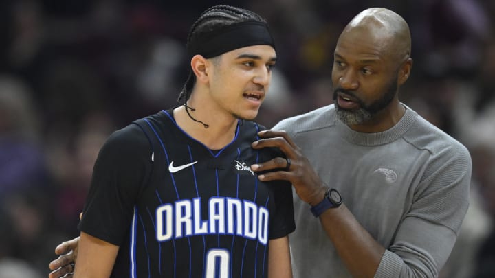 Orlando Magic head coach Jamahl Mosley talks with guard Anthony Black (0) in the second quarter against the Cleveland Cavaliers at Rocket Mortgage FieldHouse. 