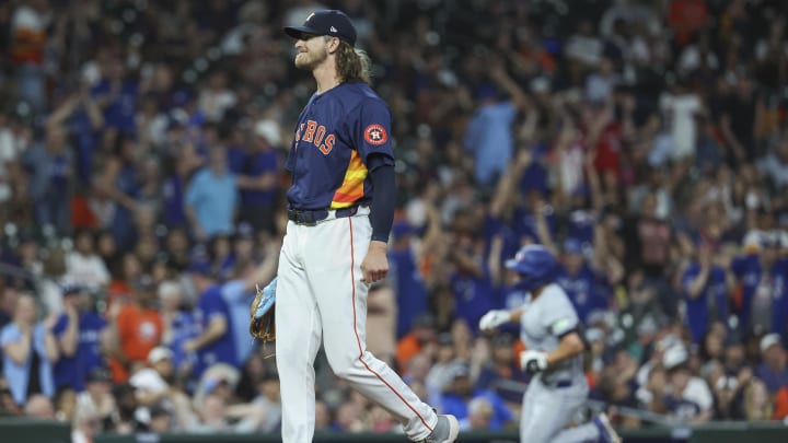 Apr 2, 2024; Houston, Texas, USA; Houston Astros relief pitcher Josh Hader (71) reacts and Toronto Blue Jays left fielder Davis Schneider (36) rounds the bases after hitting a home run during the ninth inning at Minute Maid Park.