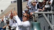Penn State football James Franklin takes a selfie with students following the Blue-White Game at Beaver Stadium. 