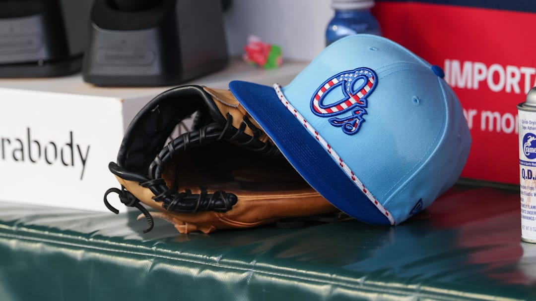 Jul 4, 2025; Atlanta, Georgia, USA; A detailed view of the Baltimore Orioles 4th of July hat in the dugout against the Atlanta Braves in the third inning at Truist Park. 