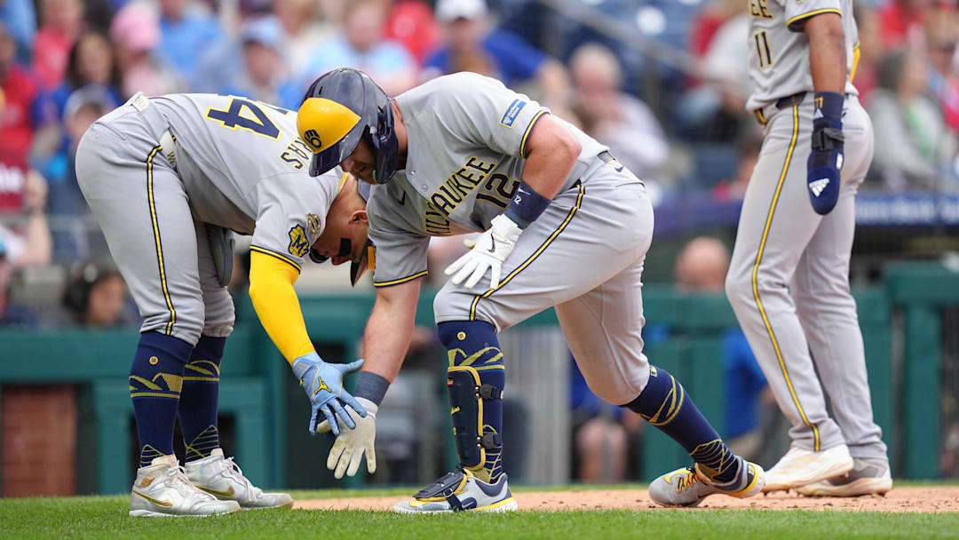May 31, 2025; Philadelphia, Pennsylvania, USA; Milwaukee Brewers infielder Rhys Hoskins (12) reacts with catcher William Contreras (24) after hitting a three-run home run against the Philadelphia Phillies in the fourth inning at Citizens Bank Park. Mandatory Credit: Kyle Ross-Imagn Images