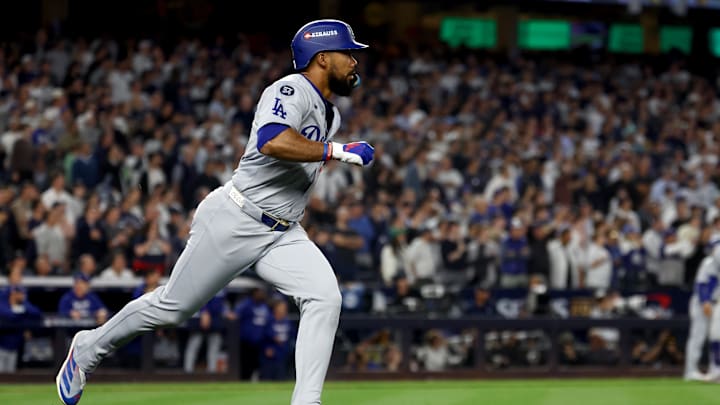 Oct 30, 2024; New York, New York, USA; Los Angeles Dodgers outfielder Teoscar Hernandez (37) hits a two-RBI double during the fifth inning against the New York Yankees in game five of the 2024 MLB World Series at Yankee Stadium. Mandatory Credit: Vincent Carchietta-Imagn Images