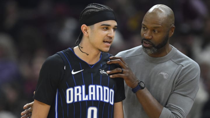 Orlando Magic head coach Jamahl Mosley talks with guard Anthony Black (0) in the second quarter against the Cleveland Cavaliers at Rocket Mortgage FieldHouse. 