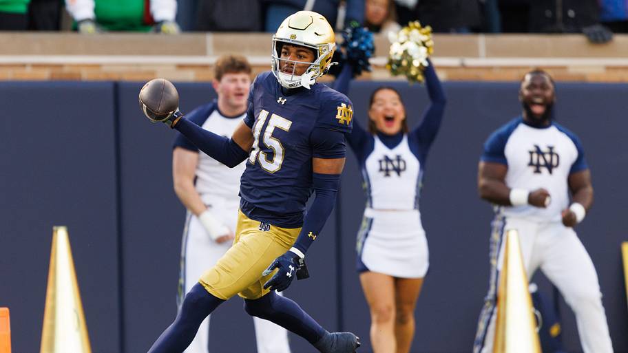 Notre Dame cornerback Leonard Moore returns an interception for a touchdown.
