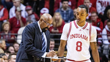 Dec 3, 2024; Bloomington, Indiana, USA; Indiana Hoosiers head coach Mike Woodson talks with forward Bryson Tucker (8) in the first half against the Sam Houston State Bearkats  at Simon Skjodt Assembly Hall. Mandatory Credit: Trevor Ruszkowski-Imagn Images