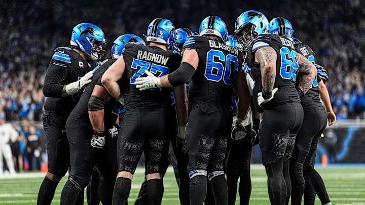 Detroit Lions offensive line huddle before a play against Minnesota Vikings during the second half at Ford Field in Detroit on Sunday, Jan. 5, 2025.