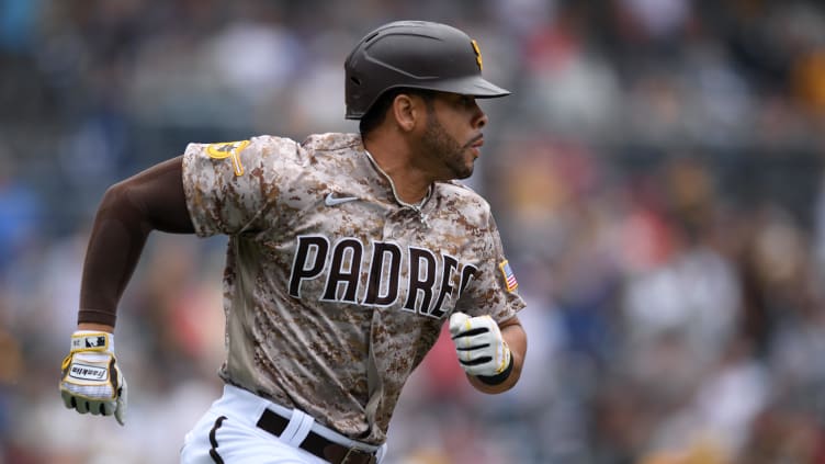 San Diego Padres left fielder Tommy Pham (28) watches his hit fall into the outfield.