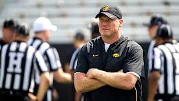 Aug 9, 2025; Iowa offensive line coach George Barnett looks on during the Hawkeyes Kids Day NCAA football open practice at Kinnick Stadium in Iowa City, Iowa. Mandatory Credit: Joseph Cress for the Des Moines Register