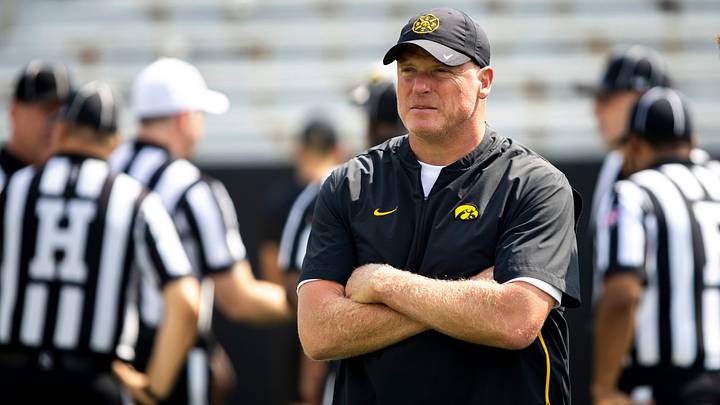 Aug 9, 2025; Iowa offensive line coach George Barnett looks on during the Hawkeyes Kids Day NCAA football open practice at Kinnick Stadium in Iowa City, Iowa. Mandatory Credit: Joseph Cress for the Des Moines Register