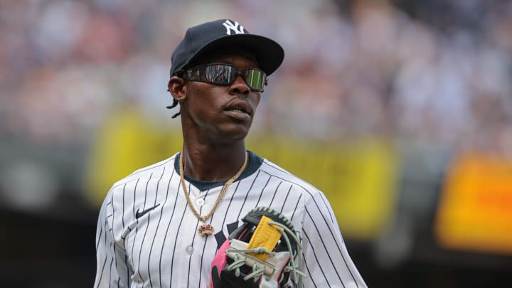 Aug 4, 2024; Bronx, New York, USA; New York Yankees third baseman Jazz Chisholm Jr. (13) jogs off the field after the top of the second inning against the Toronto Blue Jays at Yankee Stadium. Mandatory Credit: Vincent Carchietta-USA TODAY Sports