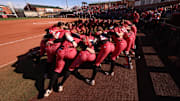 Nebraska softball players gather before a game against Northern Iowa at Bowlin Stadium on March 9, 2025.