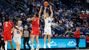 Dallin Hall drills a long shot over Arizona.