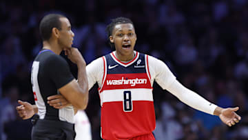 Apr 13, 2025; Miami, Florida, USA; Washington Wizards guard Bub Carrington (8) argues with an official against the Miami Heat during the second half at Kaseya Center. Mandatory Credit: Rhona Wise-Imagn Images