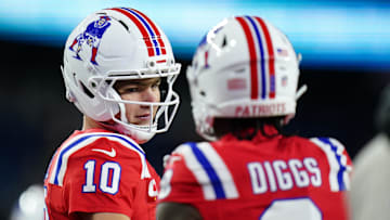New England Patriots quarterback Drake Maye (10) with wide receiver Stefon Diggs 