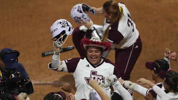 exas A&M infielder Mya Perez (24) reacts after hitting a home run during a game against South Carolina