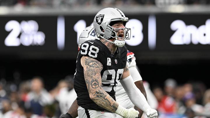 Oct 15, 2023; Paradise, Nevada, USA; Las Vegas Raiders defensive end Maxx Crosby (98) reacts to a play against the New England Patriots in the second quarter at Allegiant Stadium. Mandatory Credit: Candice Ward-Imagn Images