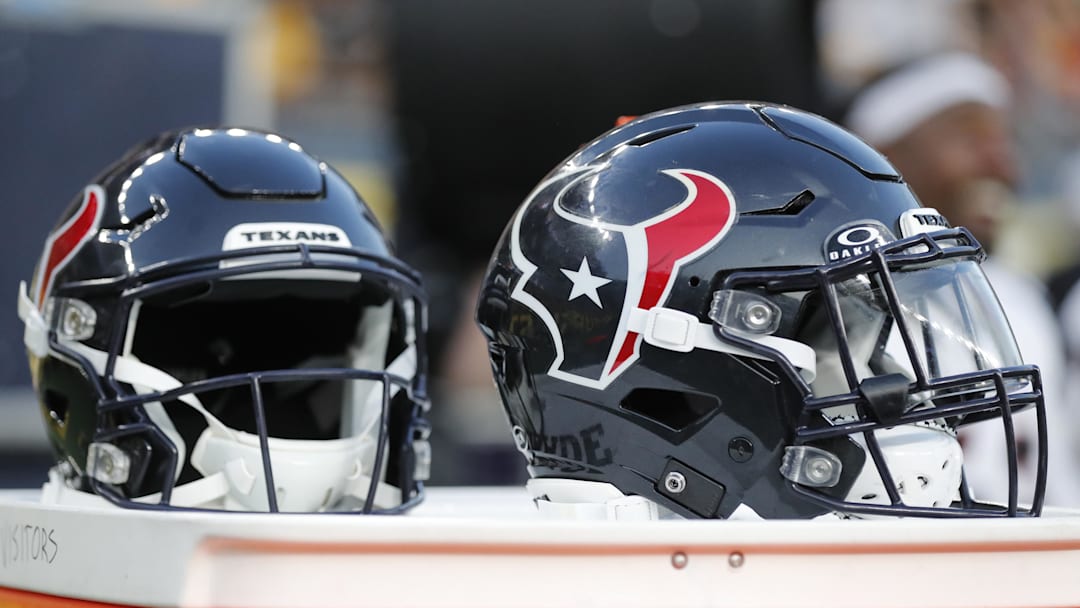 Aug 9, 2024; Pittsburgh, Pennsylvania, USA;  Houston Texans helmets sit on an equipment trunk during the second quarter against the Pittsburgh Steelers at Acrisure Stadium. Mandatory Credit: Charles LeClaire-Imagn Images