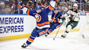 Apr 4, 2025; Elmont, New York, USA;  New York Islanders defenseman Alexander Romanov (28) celebrates in the second period against the Minnesota Wild at UBS Arena. Mandatory Credit: Wendell Cruz-Imagn Images