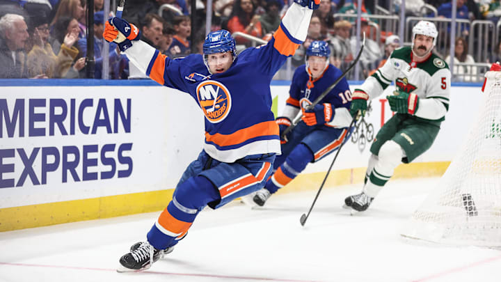 Apr 4, 2025; Elmont, New York, USA;  New York Islanders defenseman Alexander Romanov (28) celebrates in the second period against the Minnesota Wild at UBS Arena. Mandatory Credit: Wendell Cruz-Imagn Images