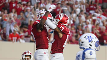 Sep 12, 2025; Bloomington, Indiana, USA; Indiana Hoosiers wide receivers Omar Cooper Jr. (3) and Elijah Sarratt (13) celebrate after a touchdown during the first half against the Indiana State Sycamores at Memorial Stadium. Mandatory Credit: Robert Goddin-Imagn Images