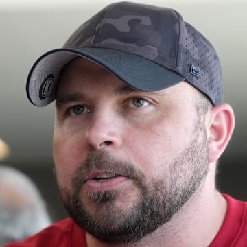 Arizona Cardinals offensive line coach Klayton Adams speaks with the media as he is introduced as a new hire with fellow coaches at the Cardinals facility in Tempe on March 8, 2023.

Nfl Cardinals Offensive Assistant Coaches Introduction