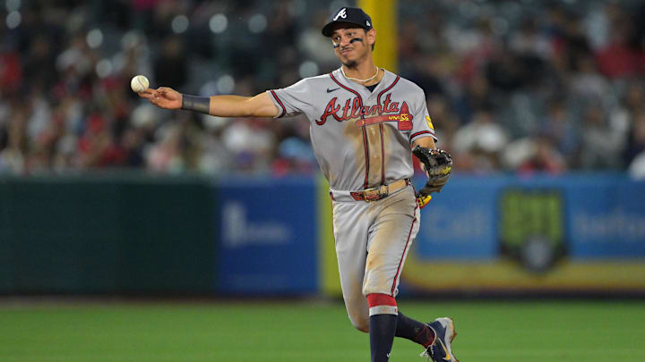 Apr 6, 2026; Anaheim, California, USA;  Atlanta Braves second baseman Mauricio Dubón (14) makes a play in the seventh inning against the Los Angeles Angels at Angel Stadium. Mandatory Credit: Jayne Kamin-Oncea-Imagn Images