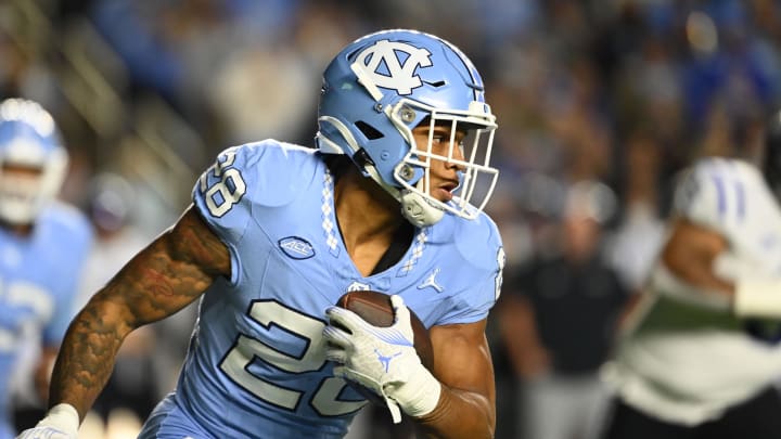 Nov 11, 2023; Chapel Hill, North Carolina, USA; North Carolina Tar Heels running back Omarion Hampton (28) with the ball in the first quarter at Kenan Memorial Stadium. Mandatory Credit: Bob Donnan-USA TODAY Sports