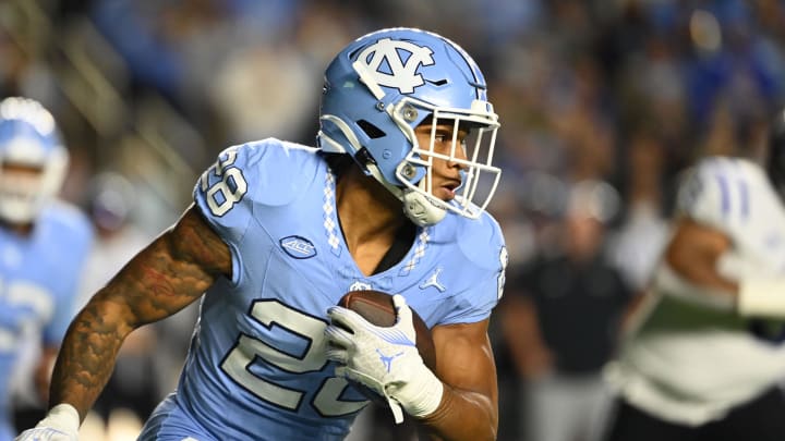 Nov 11, 2023; Chapel Hill, North Carolina, USA; North Carolina Tar Heels running back Omarion Hampton (28) with the ball in the first quarter at Kenan Memorial Stadium. Mandatory Credit: Bob Donnan-USA TODAY Sports