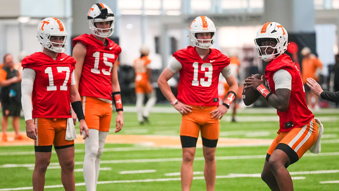 Tennessee quarterbacks, from left, Ryan Staub (17), George MacIntyre (15), Mason Phillips (13) and Faizon Brandon (11) during the Vols' first spring football practice in Knoxville on March 16, 2026. Tennessee quarterbacks, from left, Ryan Staub (17), George MacIntyre (15), Mason Phillips (13) and Faizon Brandon (11) during the Vols' first spring football practice in Knoxville on March 16, 2026.