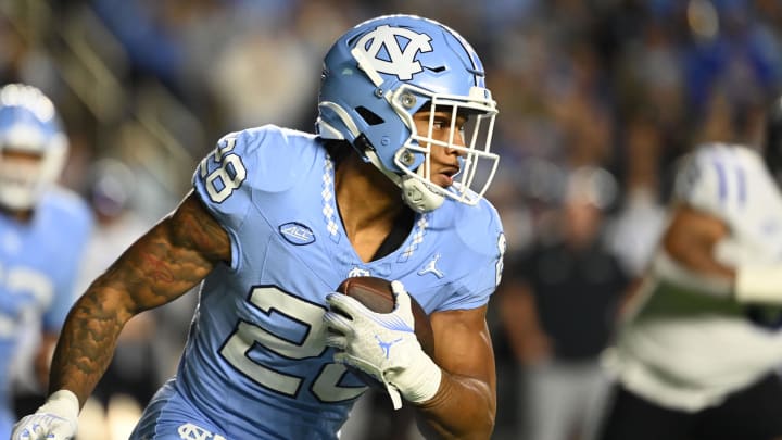 Nov 11, 2023; Chapel Hill, North Carolina, USA; North Carolina Tar Heels running back Omarion Hampton (28) with the ball in the first quarter at Kenan Memorial Stadium. Mandatory Credit: Bob Donnan-USA TODAY Sports