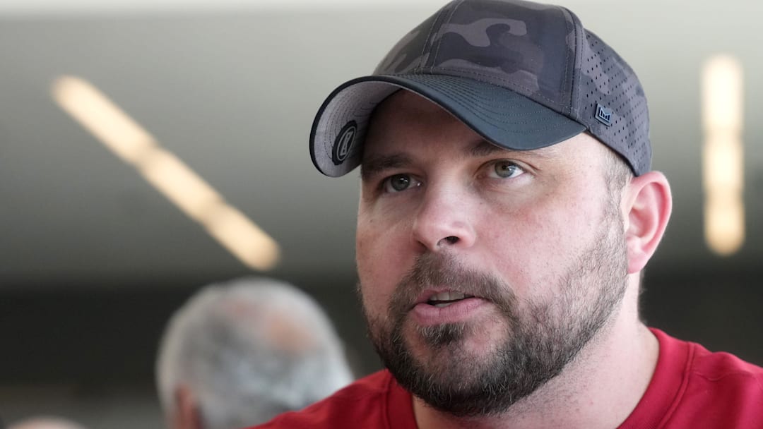 Dallas Cowboys offensive coordinator Klayton Adams speaks with the media during his time with the Arizona Cardinals.