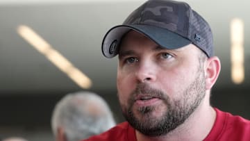 Dallas Cowboys offensive coordinator Klayton Adams speaks with the media during his time with the Arizona Cardinals.