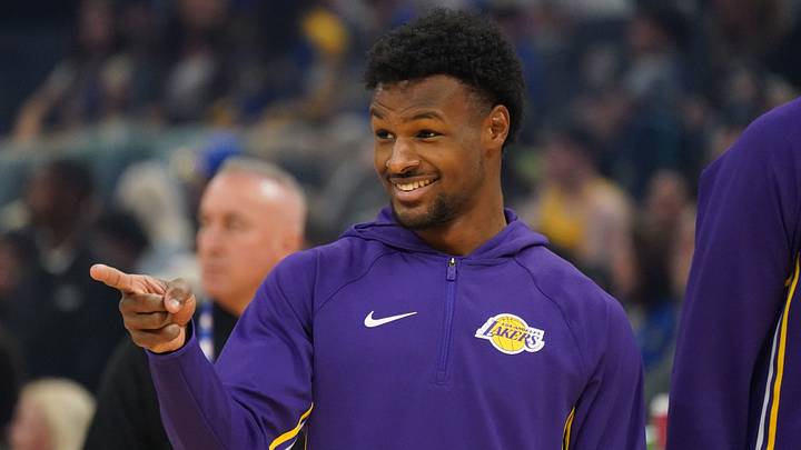 Oct 5, 2025; San Francisco, California, USA;   Los Angeles Lakers guard Bronny James (9) smiles at a teammate during warms up before the game against the Golden State Warriors at Chase Center. Mandatory Credit: David Gonzales-Imagn Images